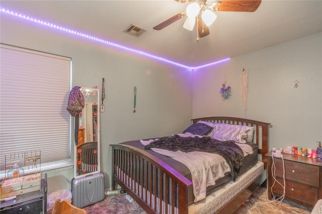 957 N Windermere Dr, Moore, OK 73160 - bedroom featuring radiator heating unit and ceiling fan
