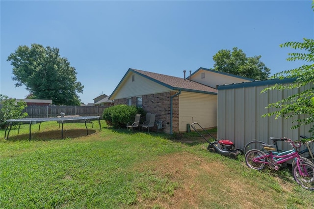 957 N Windermere Dr, Moore, OK 73160 - view of yard with a trampoline