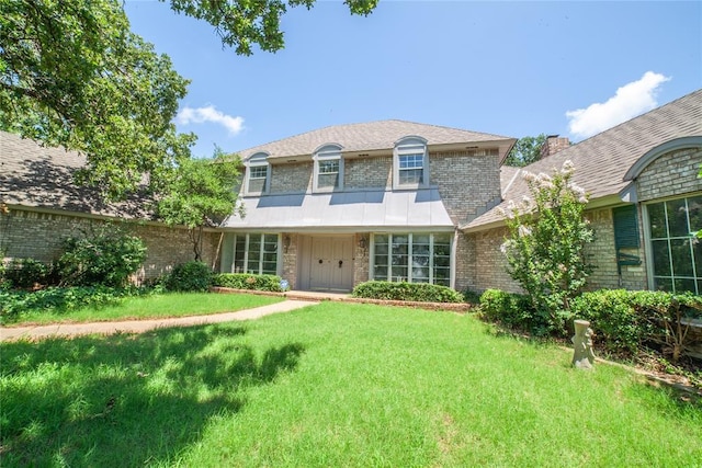 1507 Mill Creek Rd, Edmond, OK 73025 - view of front of home with a front lawn and brick siding