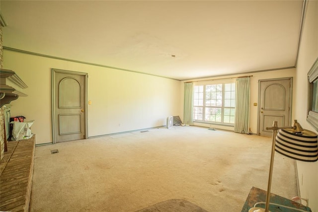 1507 Mill Creek Rd, Edmond, OK 73025 - unfurnished living room featuring carpet