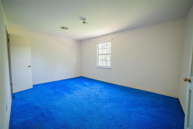 1507 Mill Creek Rd, Edmond, OK 73025 - carpeted empty room featuring baseboards