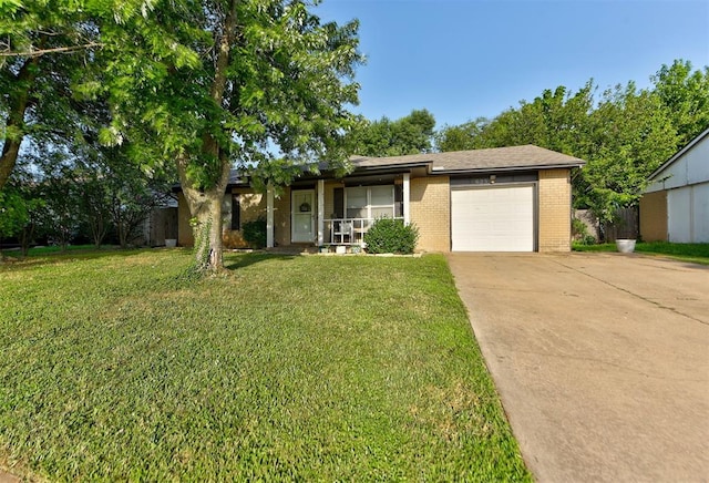 625 N Ramblin Oaks Dr, Moore, OK 73160 - ranch-style home with driveway, brick siding, a garage, and a front lawn