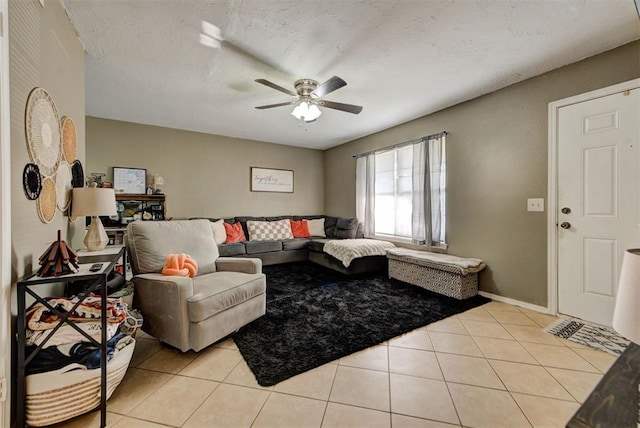 625 N Ramblin Oaks Dr, Moore, OK 73160 - living area with ceiling fan and light tile patterned flooring
