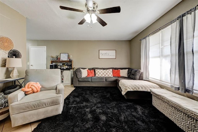 625 N Ramblin Oaks Dr, Moore, OK 73160 - living room with light tile patterned floors and a ceiling fan