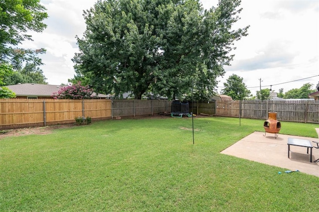8 Corona Dr, Oklahoma City, OK 73149 - fenced backyard with a patio area