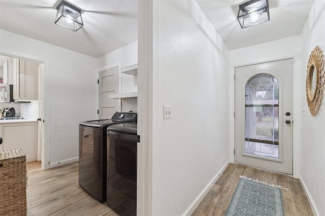 8 Corona Dr, Oklahoma City, OK 73149 - laundry area with washer and dryer and light wood-style flooring