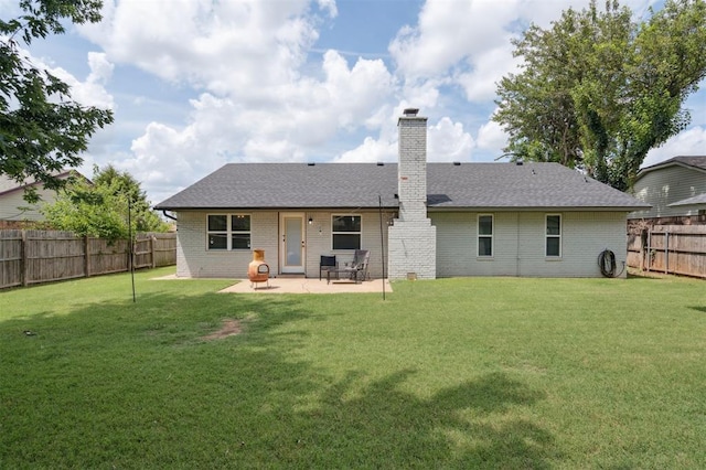 8 Corona Dr, Oklahoma City, OK 73149 - rear view of house with brick siding, a fenced backyard, a patio area, roof with shingles, and a chimney