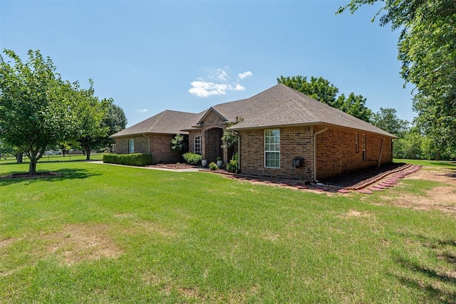 4700 SE 118th St, Oklahoma City, OK 73165 - view of front facade featuring brick siding and a front lawn