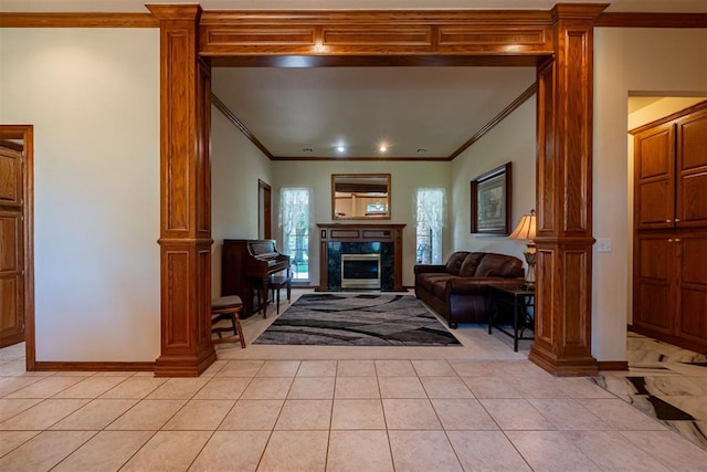 4700 SE 118th St, Oklahoma City, OK 73165 - living area featuring ornamental molding, a premium fireplace, light tile patterned flooring, and decorative columns