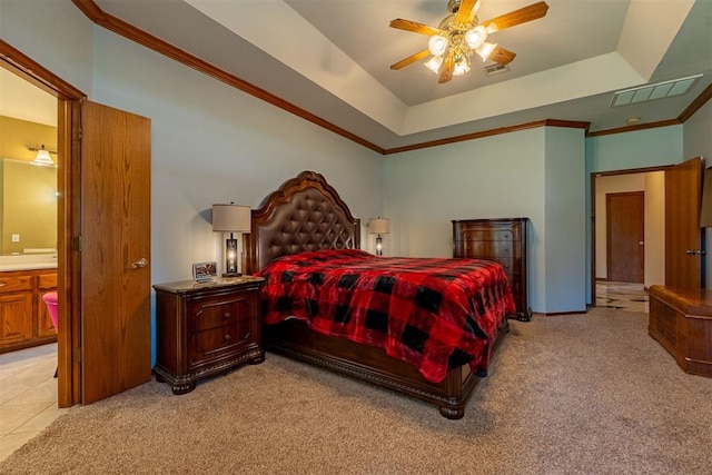 4700 SE 118th St, Oklahoma City, OK 73165 - bedroom with light colored carpet, a tray ceiling, ornamental molding, ceiling fan, and ensuite bathroom