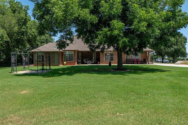 4700 SE 118th St, Oklahoma City, OK 73165 - view of front of house featuring a front lawn and brick siding