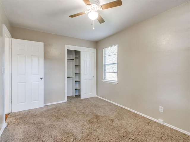 117 Asbill Ave, Yukon, OK 73099 - unfurnished bedroom with carpet flooring, a closet, and a ceiling fan