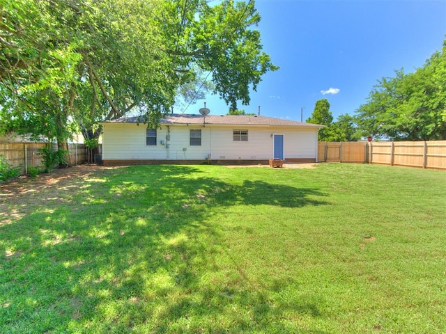 117 Asbill Ave, Yukon, OK 73099 - rear view of property with a fenced backyard