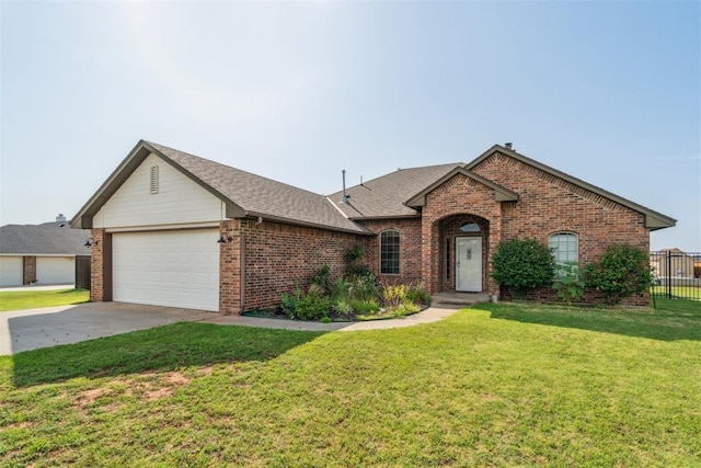 3730 Ruby Rdg, Piedmont, OK 73078 - view of front of property with brick siding, a garage, driveway, and a shingled roof