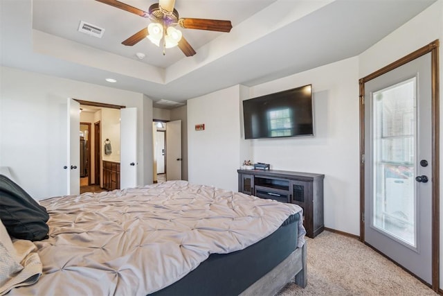 3730 Ruby Rdg, Piedmont, OK 73078 - bedroom featuring a raised ceiling, light carpet, a ceiling fan, ensuite bathroom, and recessed lighting