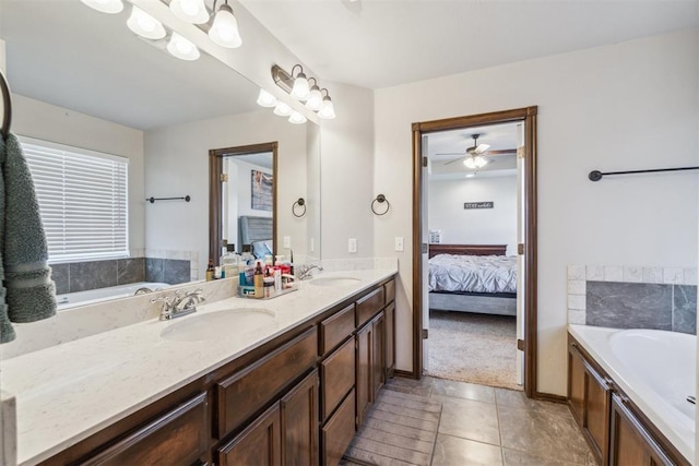 3730 Ruby Rdg, Piedmont, OK 73078 - ensuite bathroom featuring double vanity, a bath, ceiling fan, and tile patterned floors