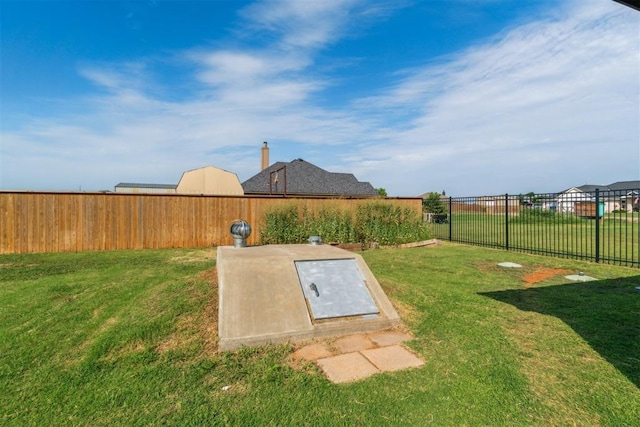 3730 Ruby Rdg, Piedmont, OK 73078 - view of storm shelter with a fenced backyard