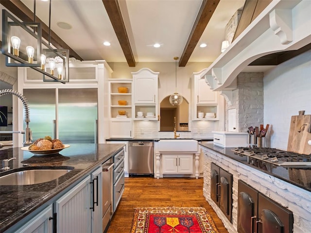 3325 Winding Creek Cir, Edmond, OK 73034 - kitchen featuring appliances with stainless steel finishes, open shelves, beamed ceiling, dark wood finished floors, and white cabinetry
