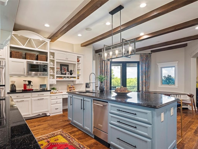 3325 Winding Creek Cir, Edmond, OK 73034 - kitchen featuring stainless steel appliances, open shelves, beam ceiling, dark wood-type flooring, and a chandelier