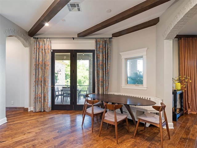 3325 Winding Creek Cir, Edmond, OK 73034 - dining space with beamed ceiling, wood finished floors, and breakfast area