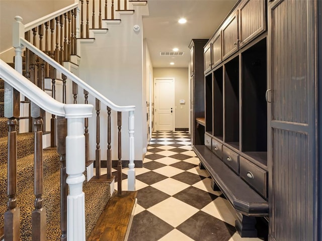 3325 Winding Creek Cir, Edmond, OK 73034 - mudroom with dark floors and recessed lighting