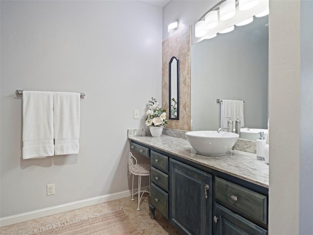 3325 Winding Creek Cir, Edmond, OK 73034 - bathroom with vanity and baseboards