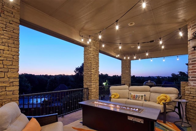 3325 Winding Creek Cir, Edmond, OK 73034 - patio / terrace with an outdoor living space with a fire pit