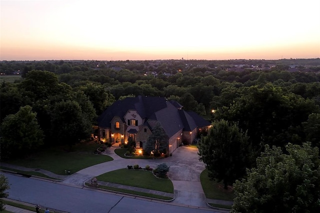 3325 Winding Creek Cir, Edmond, OK 73034 - aerial view at dusk of a wooded view