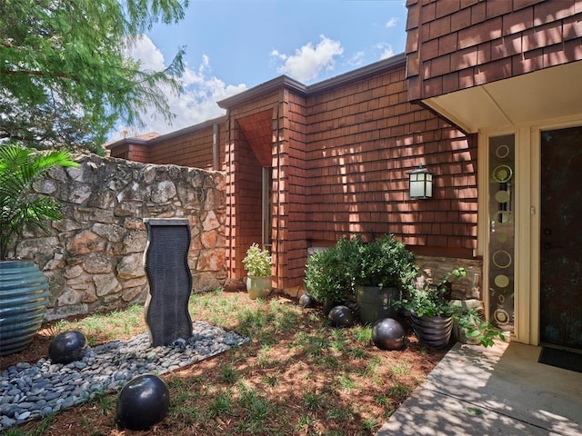 7501 Brookside Dr, Oklahoma City, OK 73132 - entrance to property with stone siding