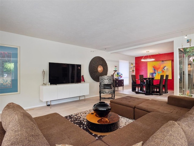 7501 Brookside Dr, Oklahoma City, OK 73132 - living room with wood finished floors and baseboards