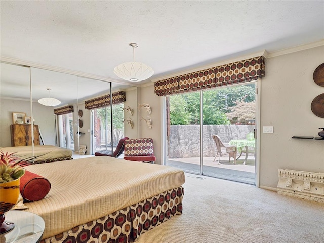 7501 Brookside Dr, Oklahoma City, OK 73132 - bedroom featuring access to outside, carpet floors, multiple windows, and ornamental molding