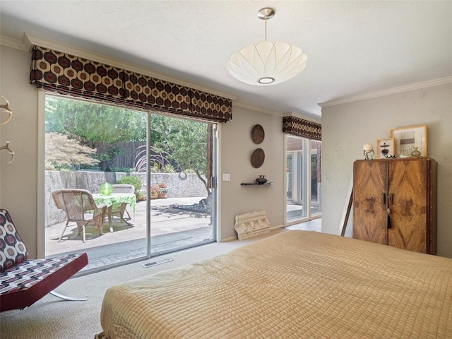 7501 Brookside Dr, Oklahoma City, OK 73132 - bedroom with access to exterior, carpet floors, and crown molding