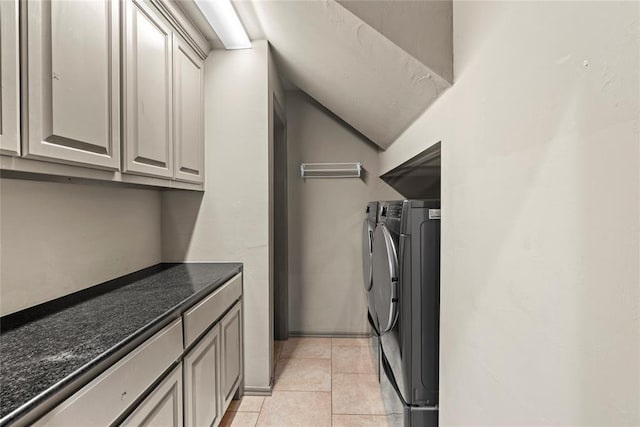2828 Ryder Dr, Yukon, OK 73099 - laundry room with separate washer and dryer, cabinet space, and light tile patterned floors