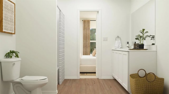 9100 SW 20th St, Oklahoma City, OK 73128 - full bathroom featuring wood finished floors, vanity, and curtained shower