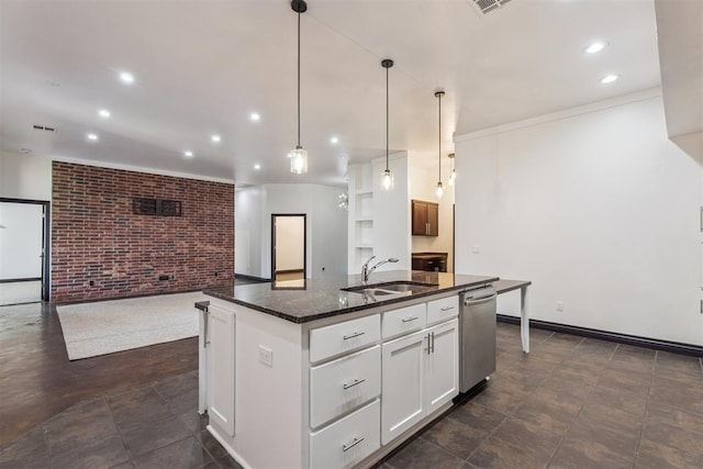 2429 NW 176th St, Edmond, OK 73012 - kitchen with dishwasher, recessed lighting, brick wall, a kitchen island with sink, and white cabinets