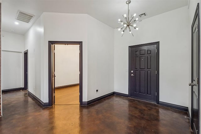 2429 NW 176th St, Edmond, OK 73012 - foyer featuring finished concrete floors and a chandelier