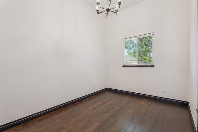 2429 NW 176th St, Edmond, OK 73012 - empty room with a chandelier and hardwood / wood-style floors