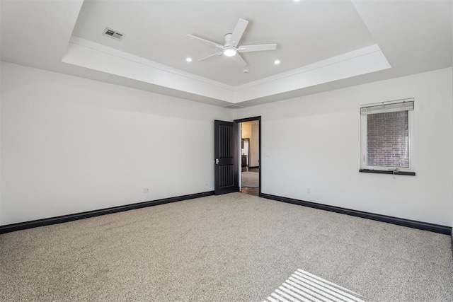 2429 NW 176th St, Edmond, OK 73012 - carpeted spare room featuring a raised ceiling, ceiling fan, recessed lighting, and ornamental molding