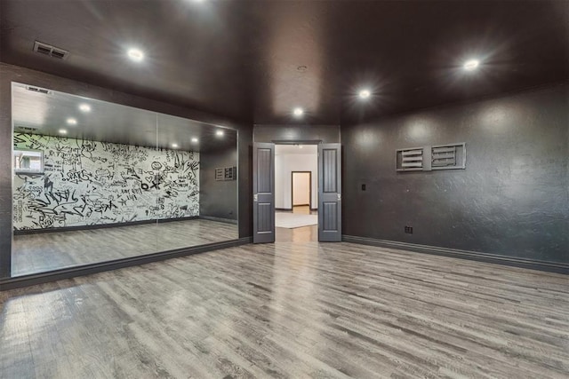 2429 NW 176th St, Edmond, OK 73012 - unfurnished room featuring wood finished floors and recessed lighting