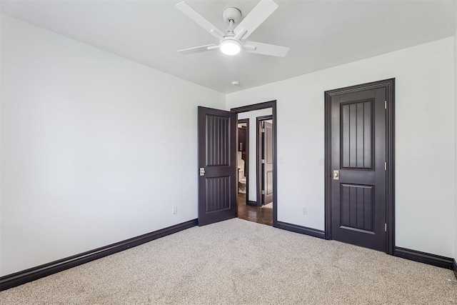 2429 NW 176th St, Edmond, OK 73012 - unfurnished bedroom with dark carpet and ceiling fan