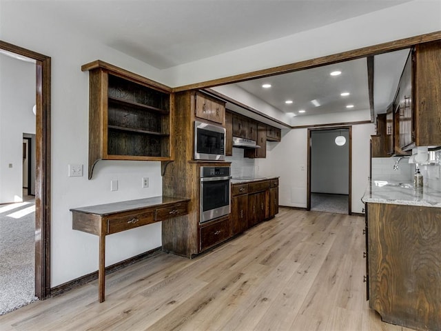 9220 Sutton Pl, Oklahoma City, OK 73132 - kitchen featuring stainless steel appliances, dark brown cabinetry, light wood finished floors, under cabinet range hood, and recessed lighting