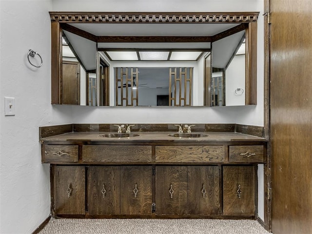 9220 Sutton Pl, Oklahoma City, OK 73132 - bathroom with vanity and a textured wall