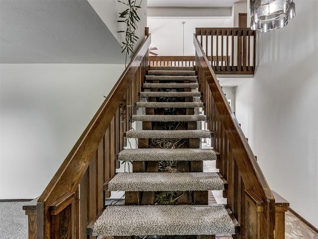 9220 Sutton Pl, Oklahoma City, OK 73132 - staircase featuring baseboards