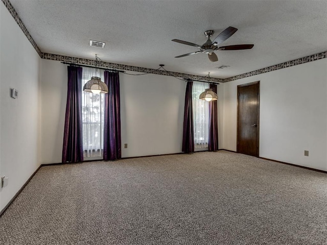 9220 Sutton Pl, Oklahoma City, OK 73132 - carpeted spare room featuring a textured ceiling and ceiling fan