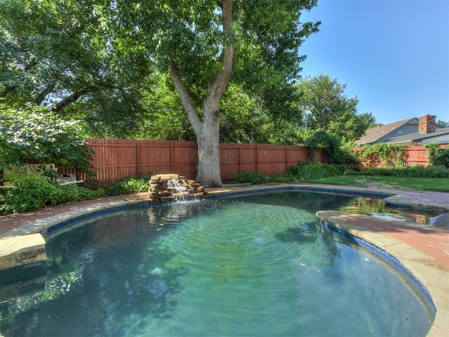 9220 Sutton Pl, Oklahoma City, OK 73132 - view of pool with a fenced backyard