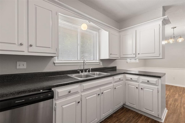 4101 NW 51st St, Oklahoma City, OK 73112 - kitchen with stainless steel dishwasher, white cabinetry, and dark countertops