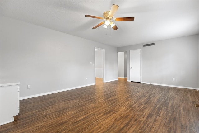 4101 NW 51st St, Oklahoma City, OK 73112 - empty room featuring a ceiling fan and dark wood-style floors
