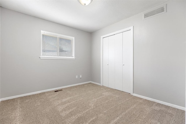 4101 NW 51st St, Oklahoma City, OK 73112 - unfurnished bedroom featuring carpet and a closet