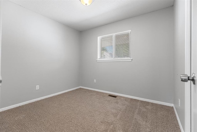 4101 NW 51st St, Oklahoma City, OK 73112 - carpeted spare room featuring baseboards