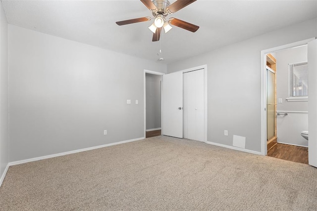 4101 NW 51st St, Oklahoma City, OK 73112 - unfurnished bedroom featuring carpet, a closet, a ceiling fan, and ensuite bathroom